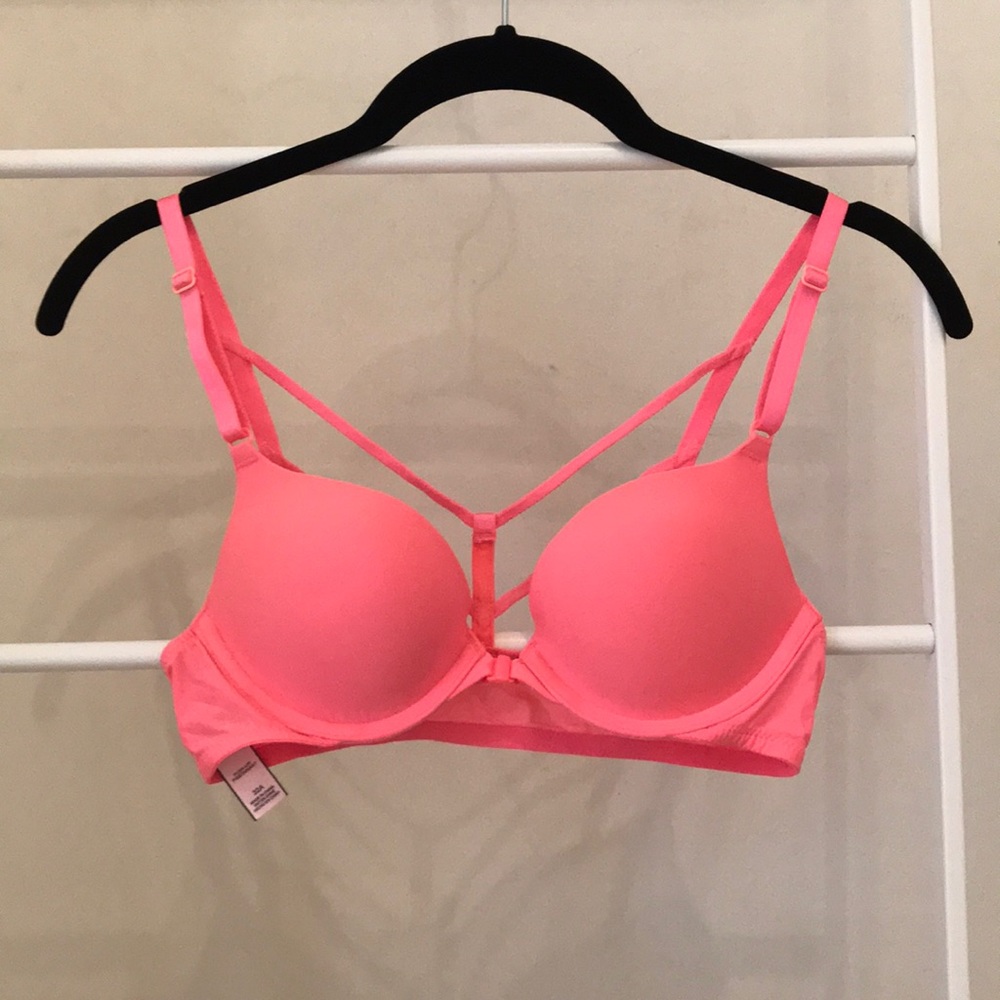 Pink front-fasten racerback push-up bra